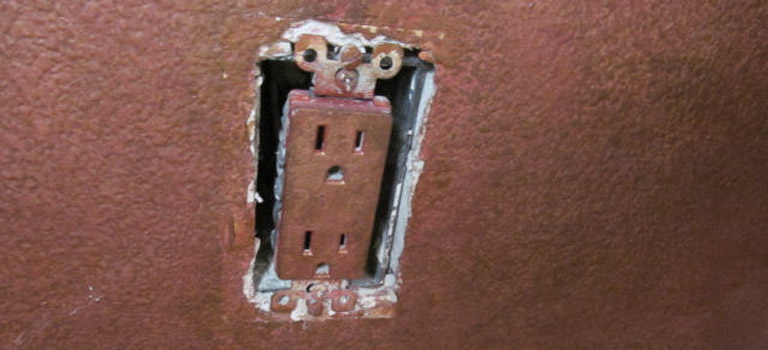 painted over electrical outlet