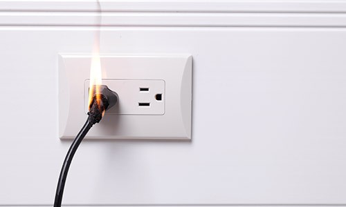 plug burning in electrical outlet
